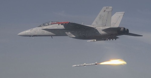A US Navy F/A-18F Super Hornet multirole combat aircraft testbed launches an AIM-120D-3 AMRAAM variant over Naval Air Station Point Mugu, California on 12 May in the second live-fire test of the missile.